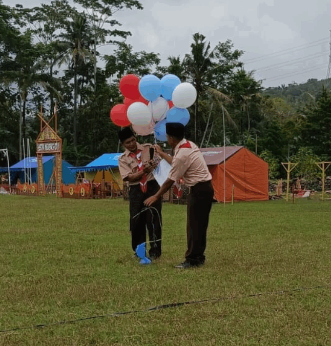 Kepala Desa Keleng Menjadi Pembina Upacara Pembukaan Perkemahan Hari Jadi Pramuka ke-64 Dabin IV Kwartir Ranting 01.04 Kesugihan